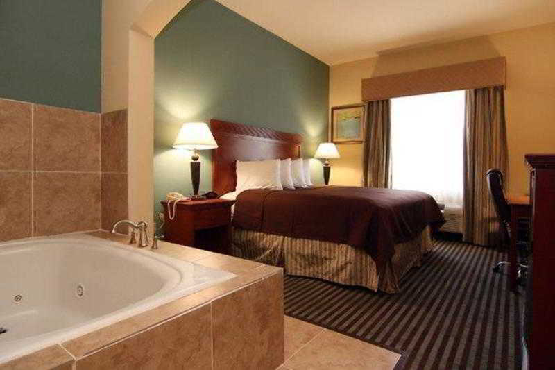 Executive Inn & Suites Marlin Habitación foto